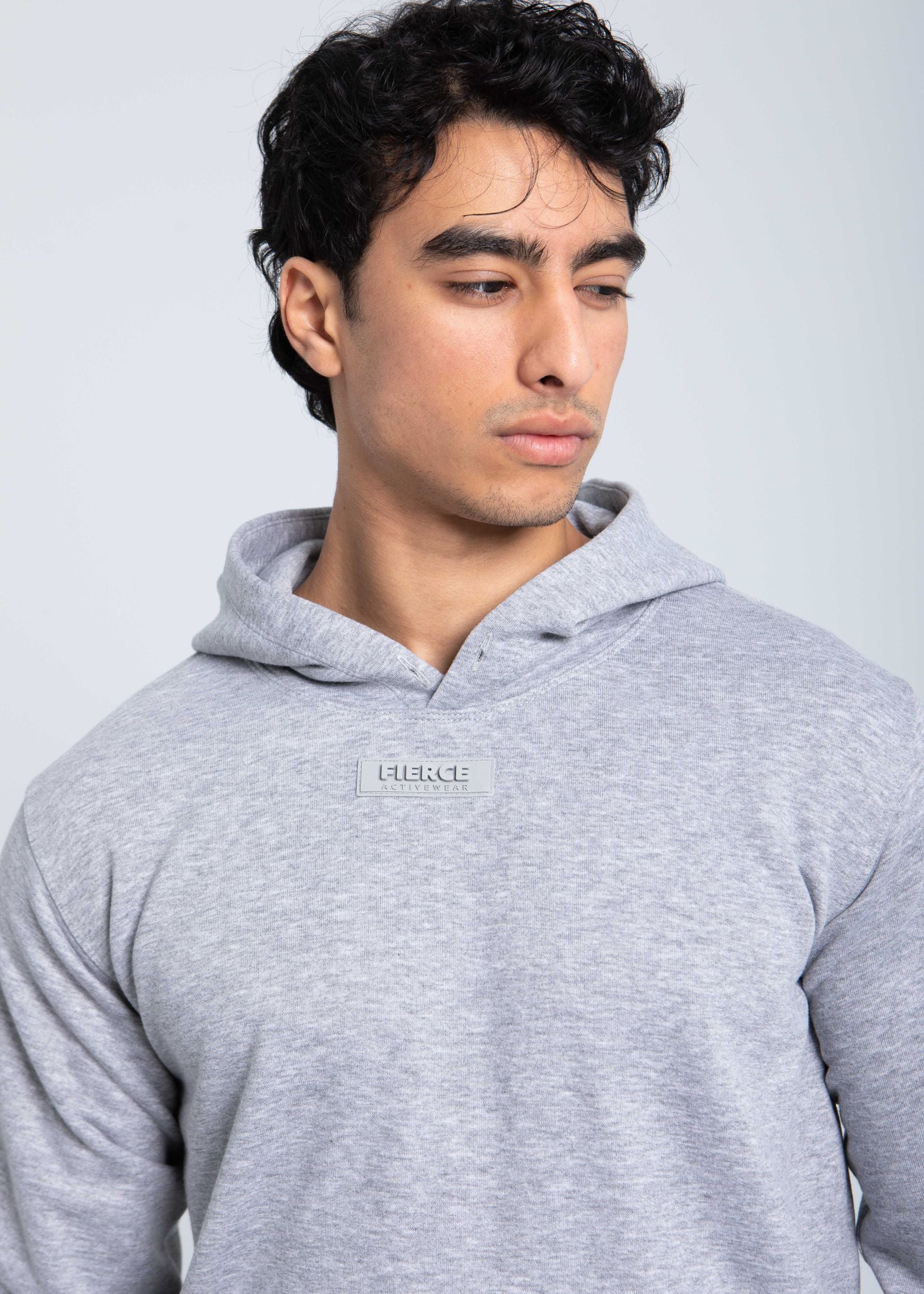 Close-up of FIERCE Activewear logo on hoodie chest