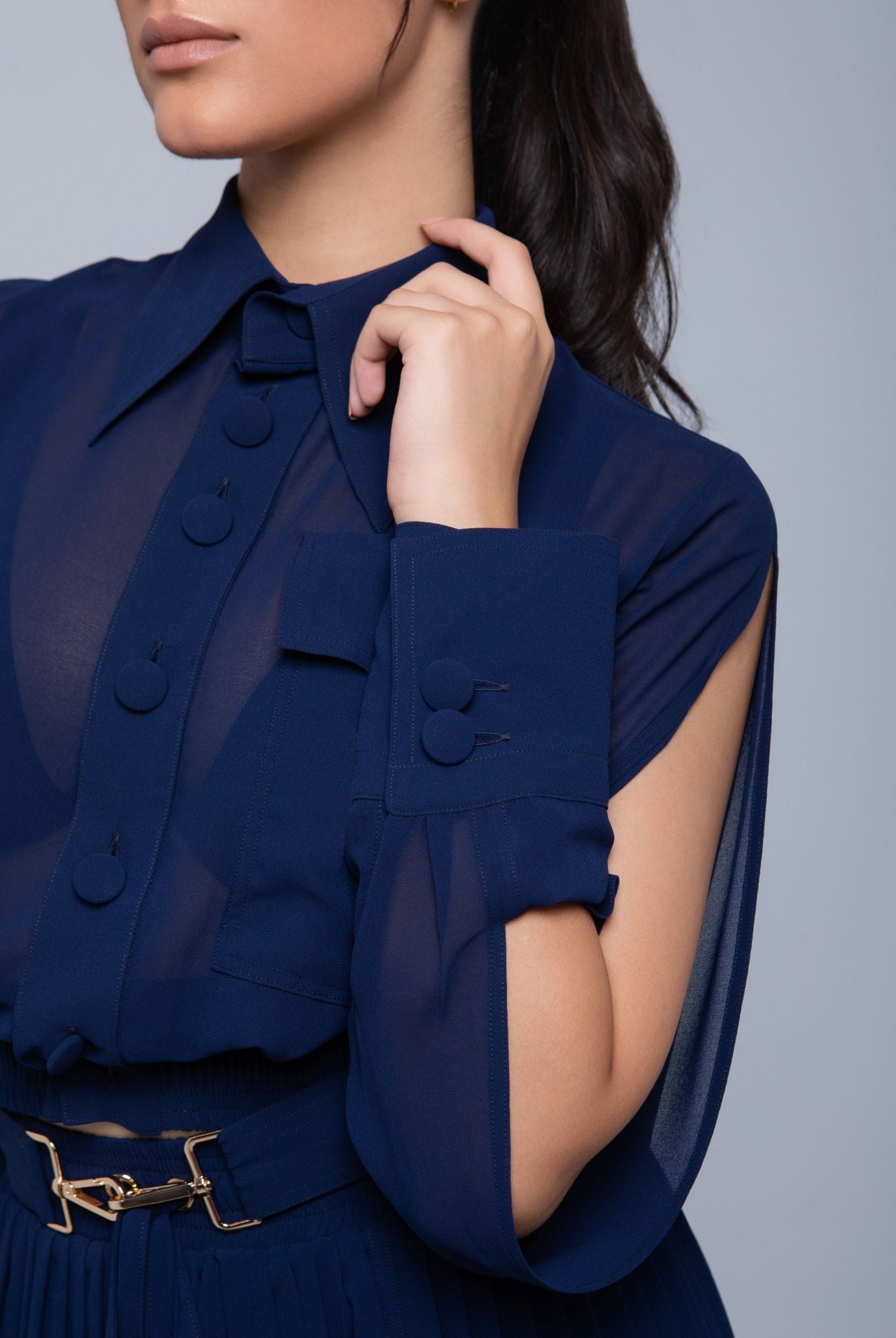 Sheer Jacket with button front, sleeve slits, and gold-accented belt