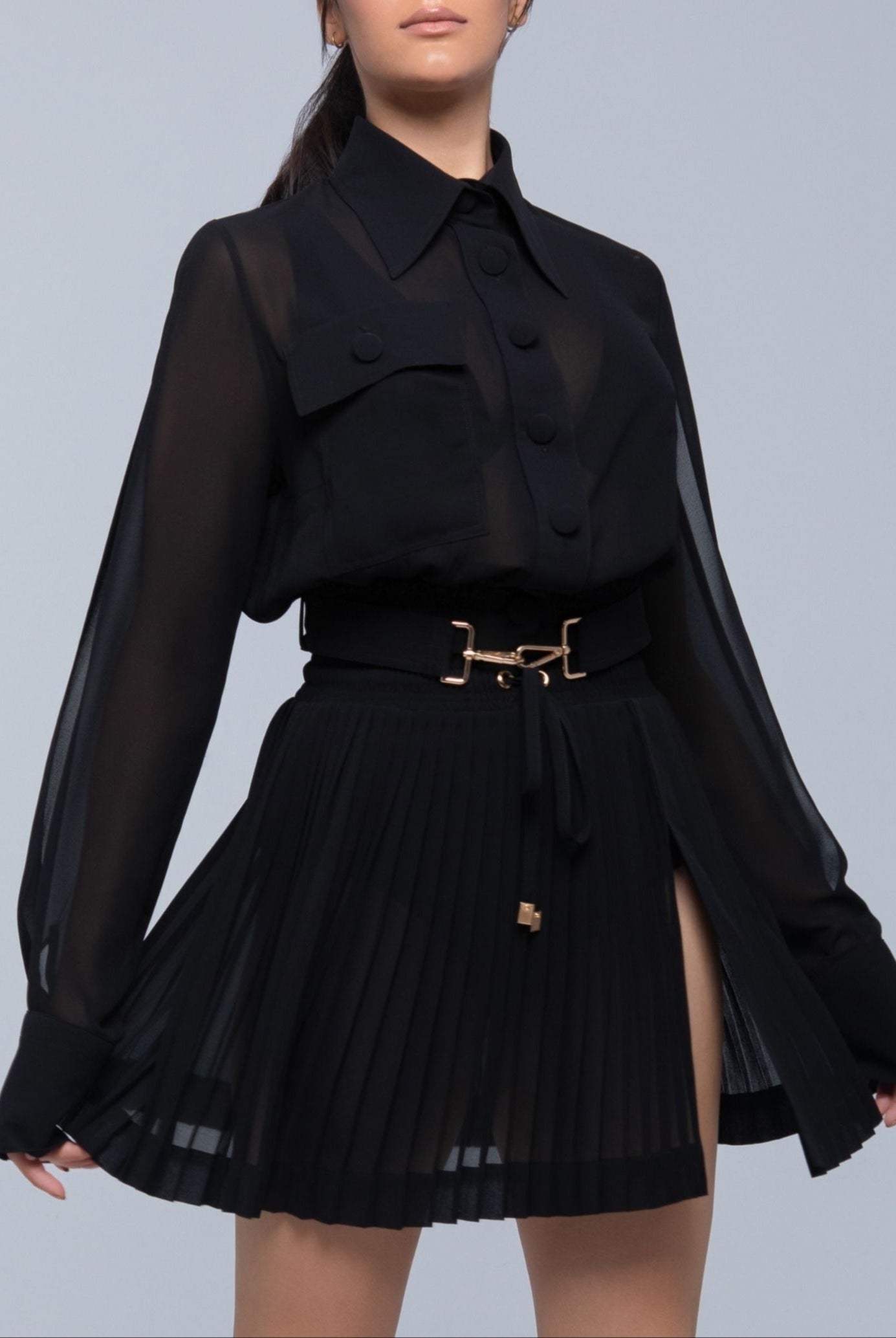 Sheer mini skirt with pleated lightweight fabric and one-side slit