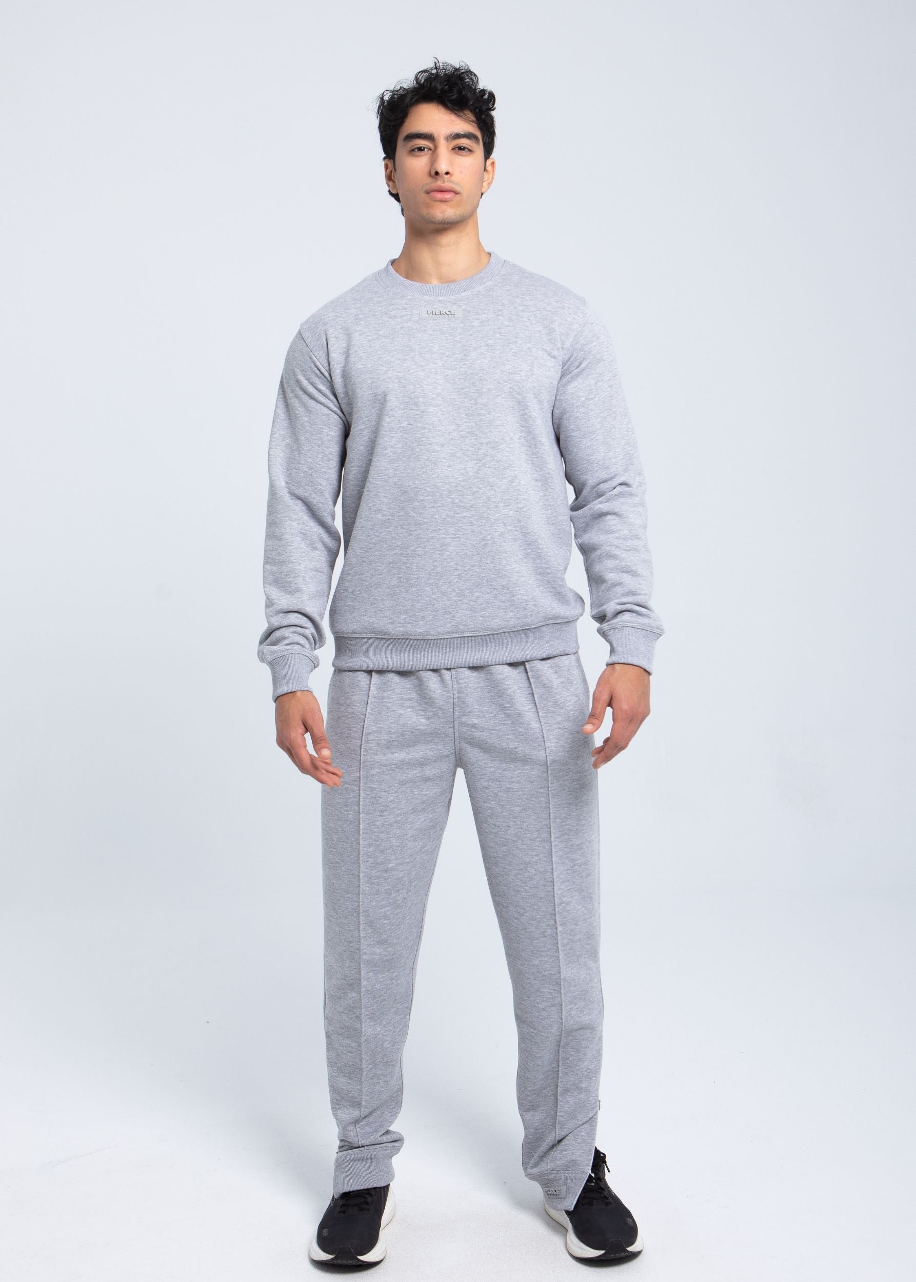 Full-body look of men wearing essential everyday fleece crewneck