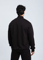Essential full-zip sweatshirt back view showing clean structure