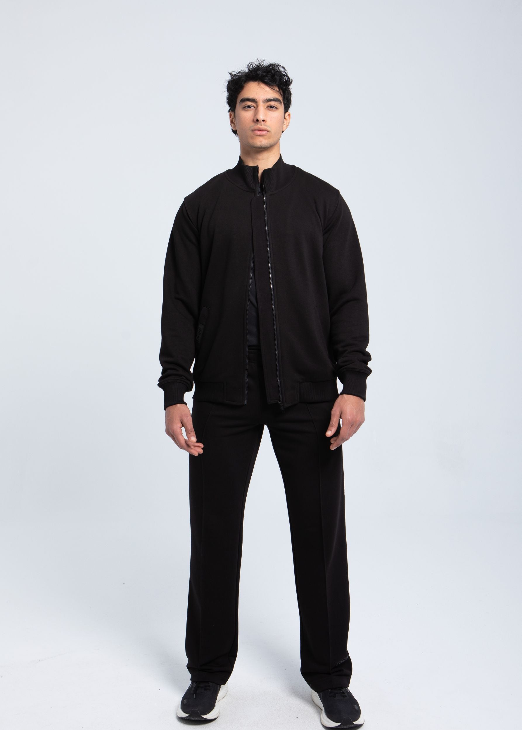 Full-body look of men’s full-zip structured sweatshirt in black