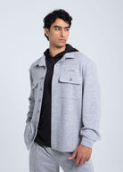 Essential fleece overshirt angled view showing button-front design