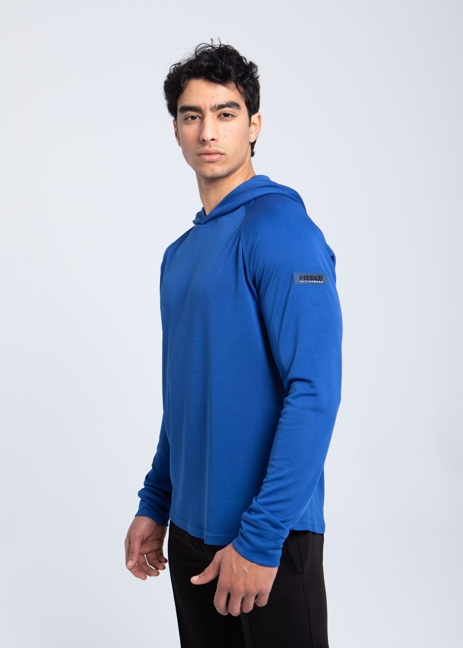 Men’s performance hooded shirt side view with left-sleeve FIERCE logo