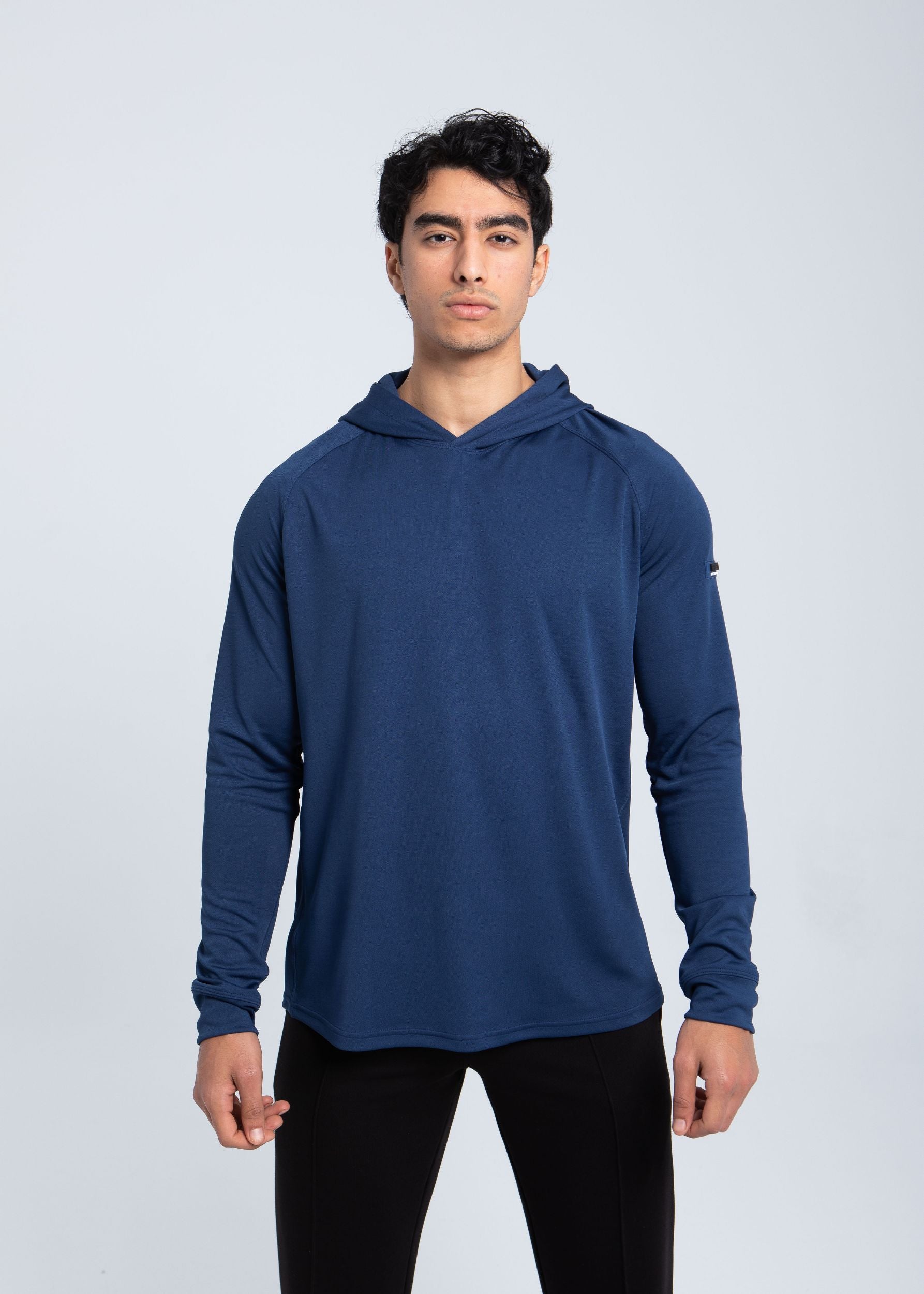 Full body view of men’s active hooded performance shirt in navy