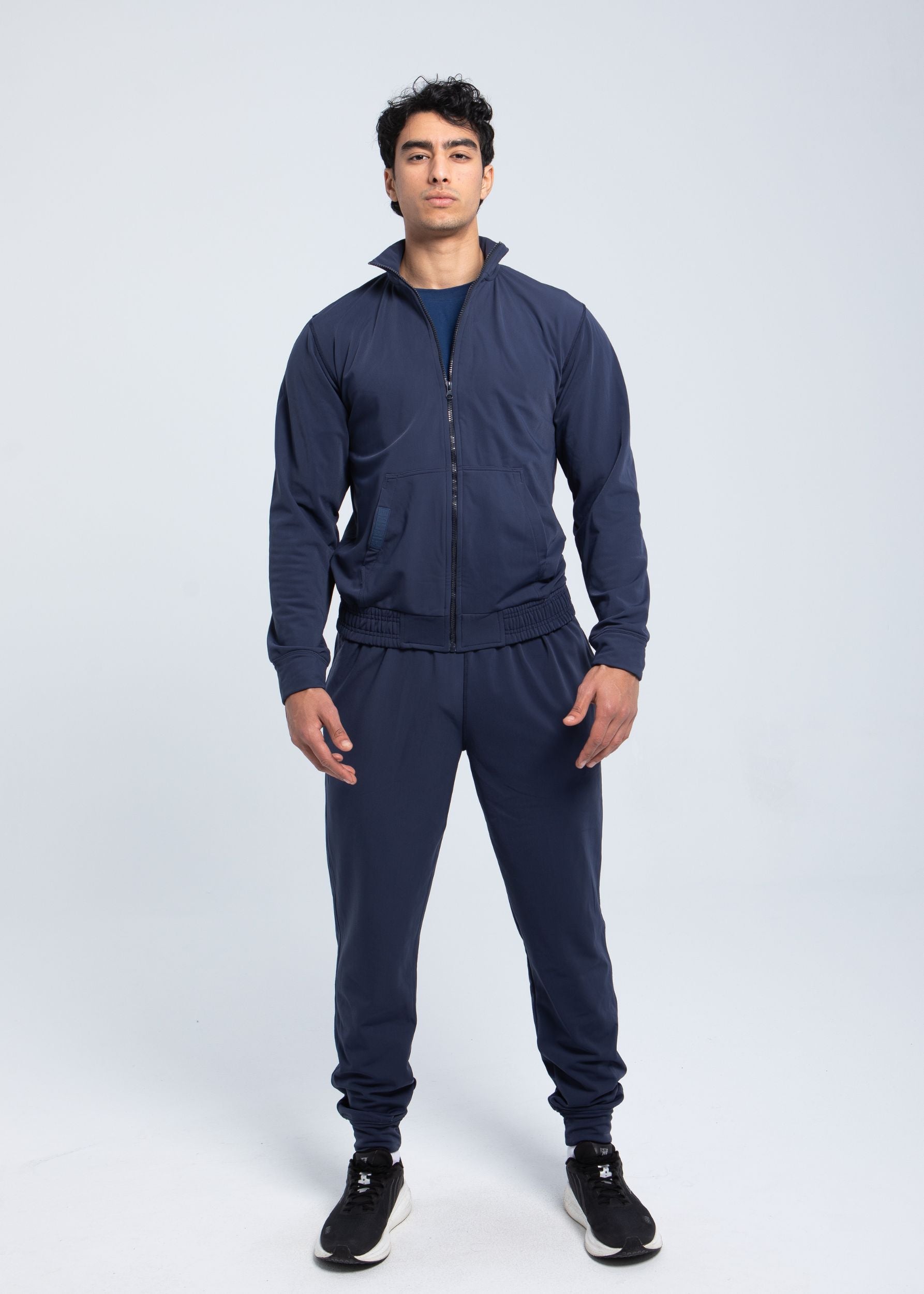 Men’s core performance pant front view in midnight navy