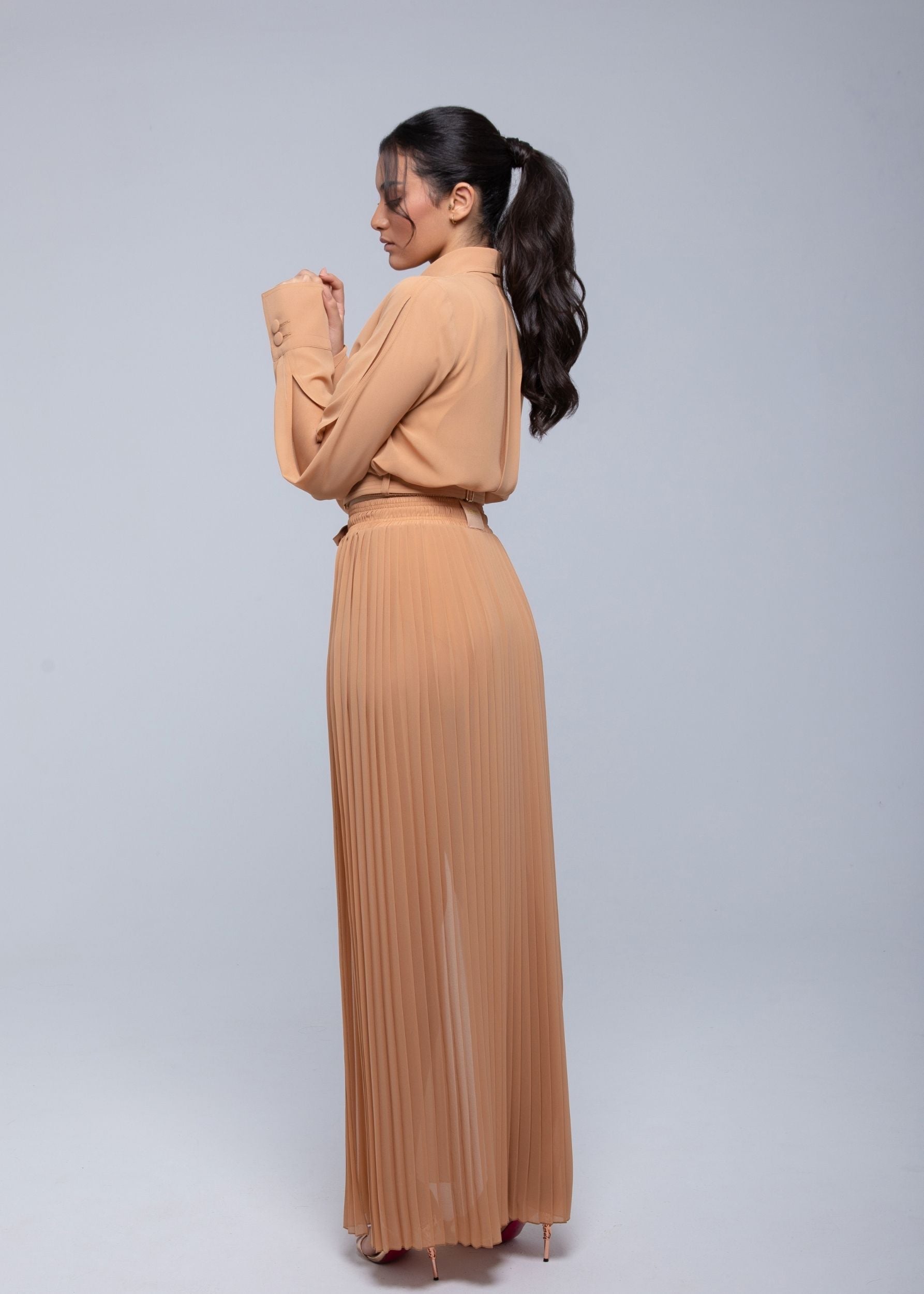 Sheer Jacket with button front, sleeve slits, and gold-accented belt