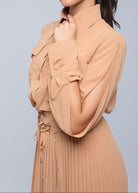 Sheer Jacket with button front, sleeve slits, and gold-accented belt